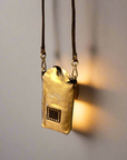 Virna. Phone Case. Gold laminated leather. X0029 F1902.