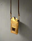 Virna. Phone Case. Gold laminated leather. X0029 F1902.