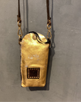 Virna. Phone Case. Gold laminated leather. X0029 F1902.