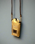 Virna. Phone Case. Gold laminated leather. X0029 F1902.