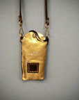 Virna. Phone Case. Gold laminated leather. X0029 F1902.