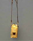 Virna. Phone Case. Gold laminated leather. X0029 F1902.